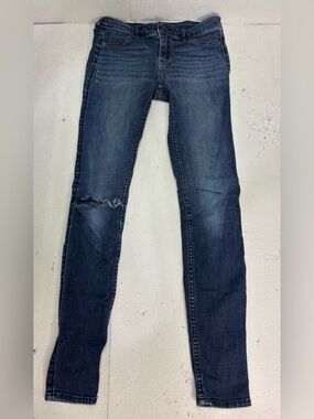 Hollister Women's Mid-Dark Blue Skinny Jeans with Knee Distress